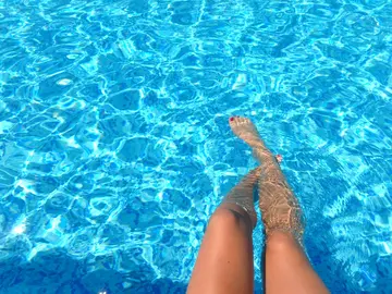 person-feet-dipping-on-pool-835240 (1)