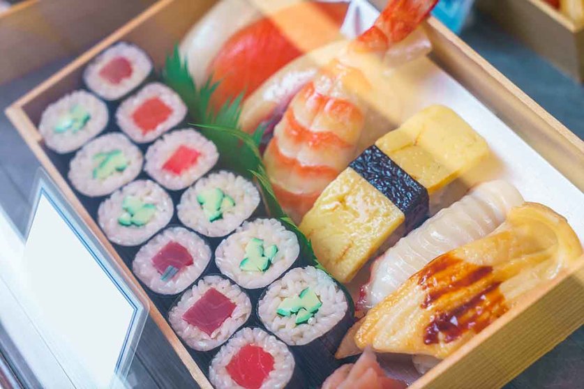 Plastic Sushi rolls in a display case