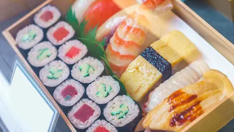 Plastic Sushi rolls in a display case